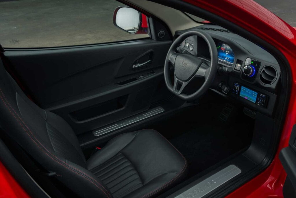 ElectraMeccanica Solo interior https://electriccarfinder.com/electrameccanica-solo-ev-price/