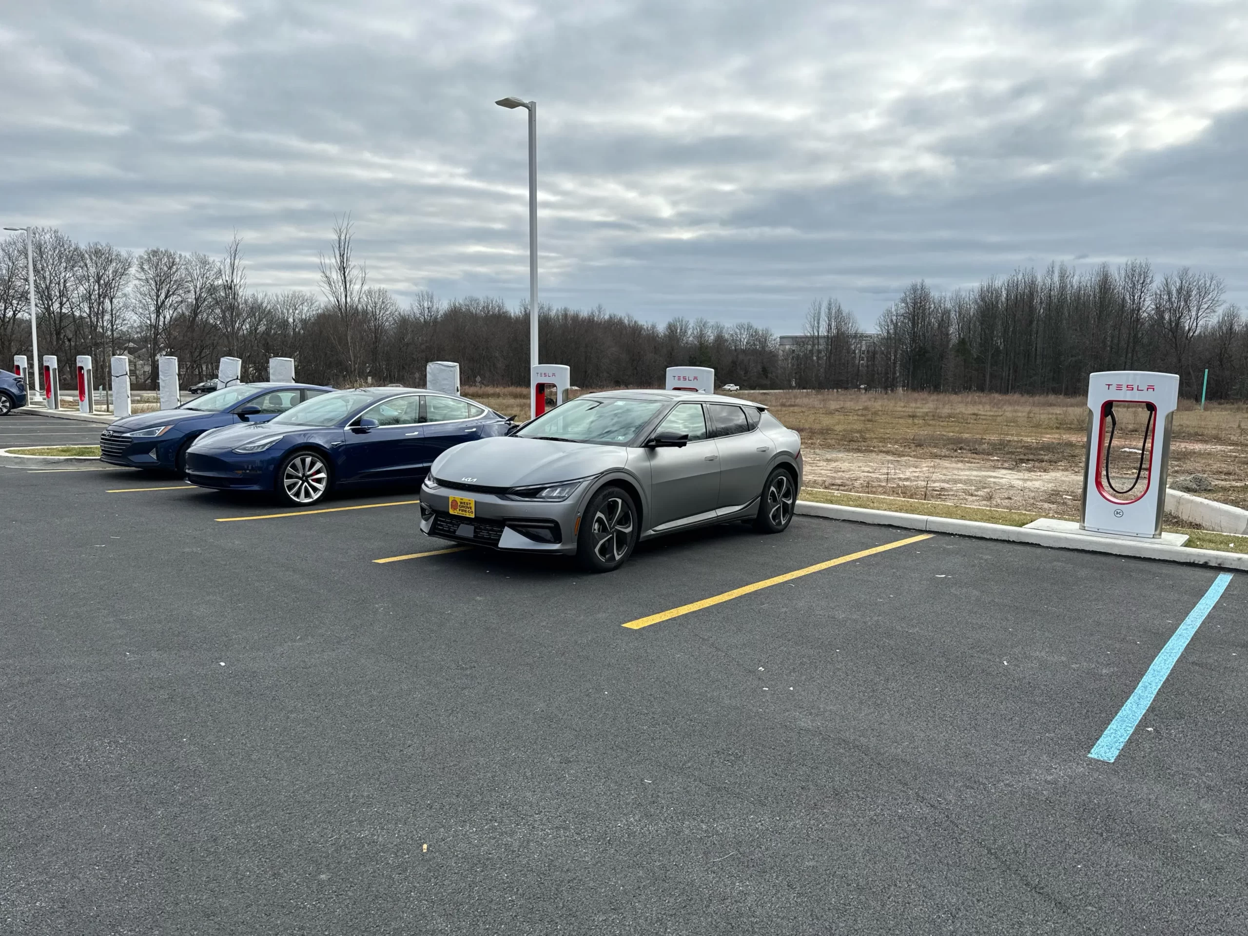 Tesla EV Charging Station scaled https://electriccarfinder.com/tesla-ev-charging-station-franchise-cost-in-usa/